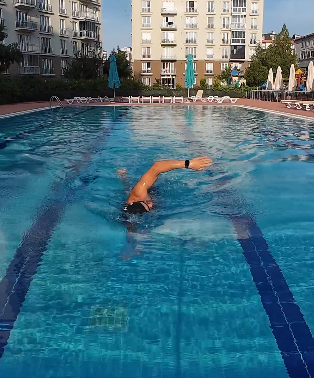 Me swimming at a pool
